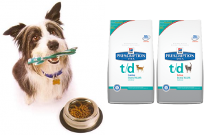 Dog with toothbrush in mouth and T/D food